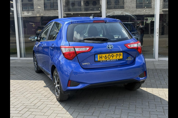 Toyota Yaris 1.5 Full Hybrid Dynamic | Lichtmetalen velgen, Parkeercamera, Licht + Regensensor, Cruise control, Climate control