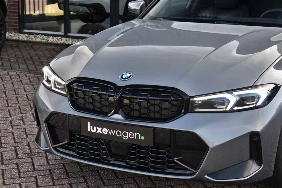 BMW 3 Serie Touring 330e xDrive M-Sport Pano 19inch El-zetels HUD 360-cam LCI-2