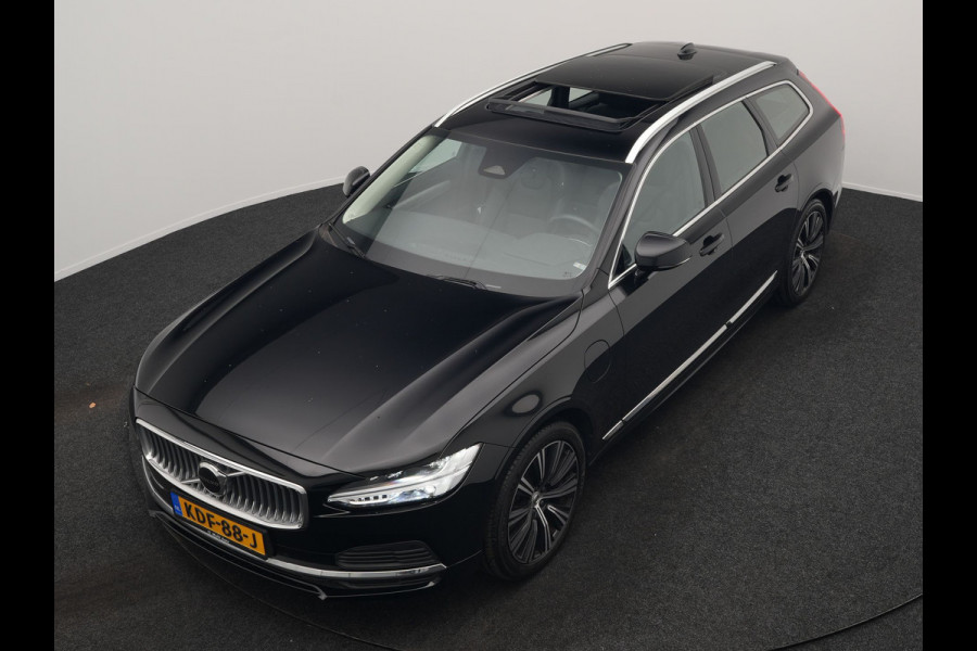 Volvo V90 T6 AWD Ultimate Bright PHEV 350pk | Panodak | Adaptive Cruise | Camera | Harman / Kardon | Lederen Sportstoelen Memory & Verwarmd | Google Assistent | Keyless | Stuur Verwarmd | Blis | Apple Carplay | DAB | Virtual | Plug In Hybrid |