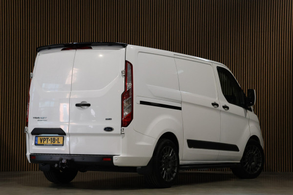 Ford Transit Custom 2.0 TDCI Raptor Edition | Automaat | CarPlay | Cruise control | PDC | Trekhaak | Nieuwe APK | Euro 6