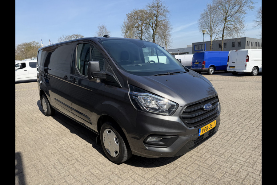 Ford Transit Custom 300 2.0 TDCI L2H1 Trend / vaste prijs rijklaar € 21.950 ex btw / dubbele schuifdeur / lease vanaf € 358 / airco / cruise / camera / pdc voor en achter / euro 6 / bpm vrij