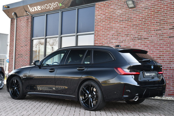 BMW 3 Serie Touring 330e M-Sport Pano ACC Trekhaak H/K HUD 19inch Stuurverw