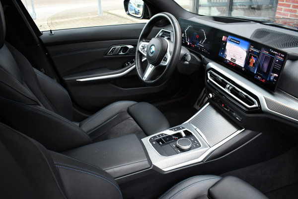 BMW 3 Serie Touring 330e M-Sport Pano ACC Trekhaak H/K HUD 19inch Stuurverw