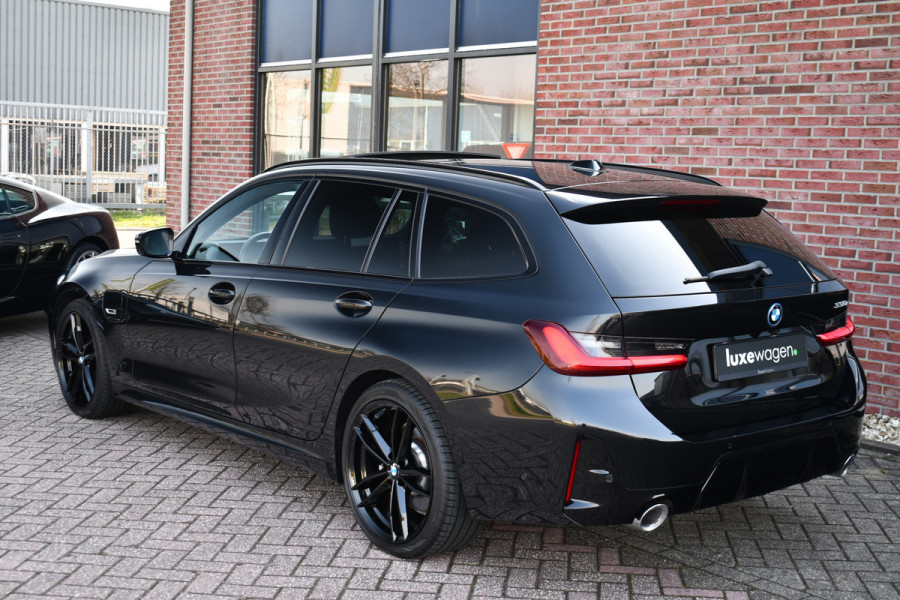 BMW 3 Serie Touring 330e M-Sport Pano ACC Trekhaak H/K HUD 19inch Stuurverw