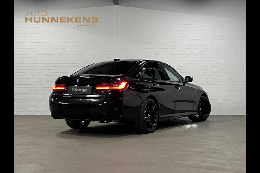 BMW 3-serie 330e M-pakket | Adapt. cruise | Open dak | Trekhaak | Head-up | Stoelverwarming | Sfeerverlichting | Carplay | Leder