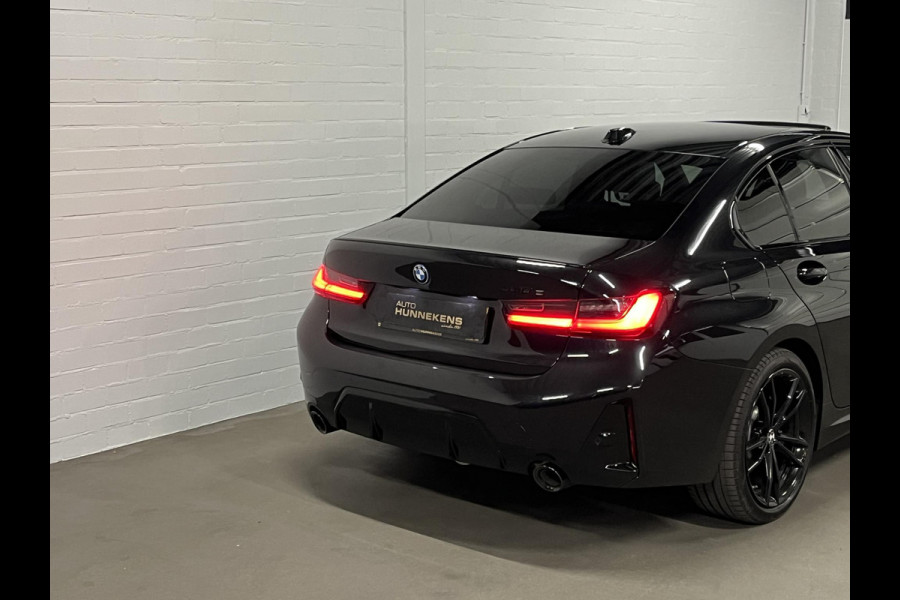 BMW 3-serie 330e M-pakket | Adapt. cruise | Open dak | Trekhaak | Head-up | Stoelverwarming | Sfeerverlichting | Carplay | Leder