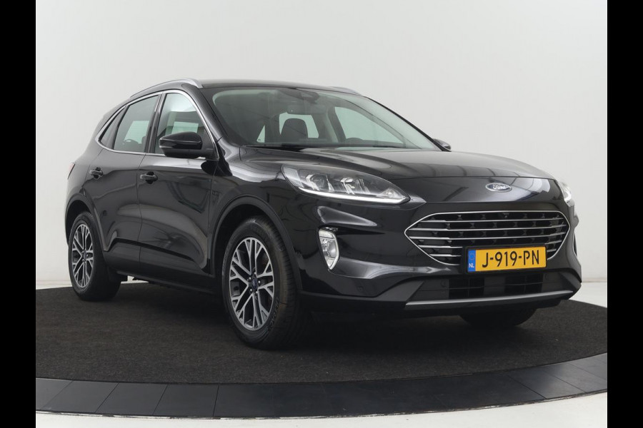 Ford Kuga 2.5 PHEV Titanium | SOH 91,5% | Trekhaak | Stoelverwarming | Adaptive cruise | Camera | Caplay | Navigatie | Dodehoek detectie | Keyless | Digital Cockpit | Achterbankverwarming | Plug In