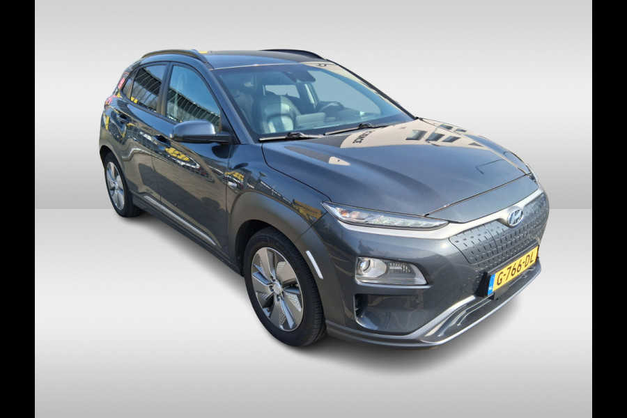 Hyundai Kona EV Premium 64 kWh / Trekhaak / Camera / Leder / Head-up / 18'' / Navigatie / Stuur+Stoelverwarming / Keyless / KRELL Audio / DAB / ACC