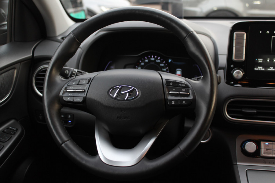 Hyundai Kona EV Premium 64 kWh / Trekhaak / Camera / Leder / Head-up / 18'' / Navigatie / Stuur+Stoelverwarming / Keyless / KRELL Audio / DAB / ACC