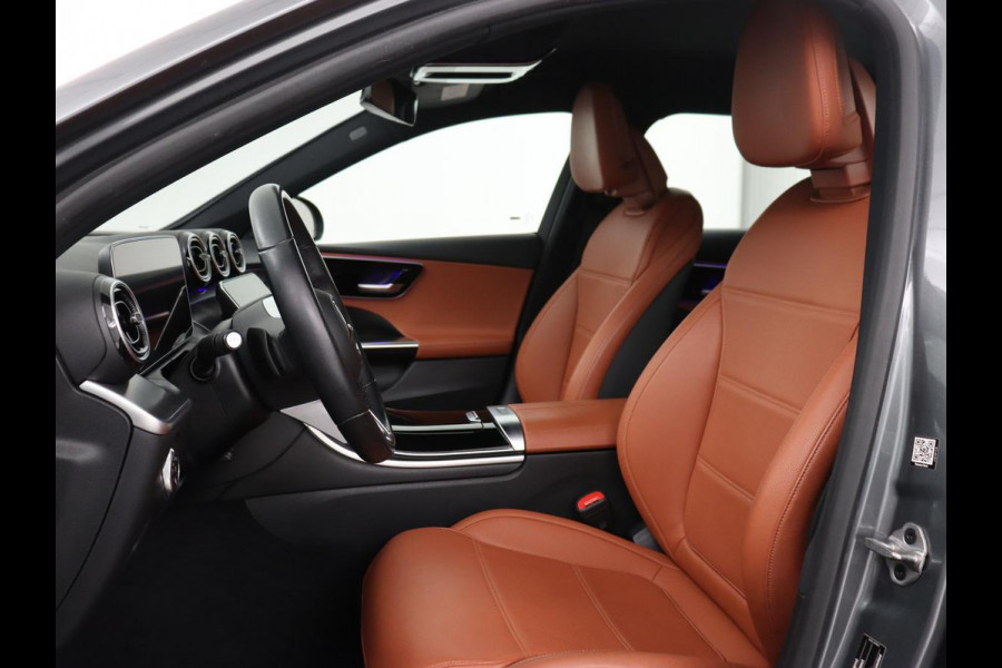 Mercedes-Benz C-Klasse 300e Luxury Line | SOH 92% | Leder | Trekhaak | Stoelverwarming | Sfeerverlichting | Carplay | Full LED | Navigatie | Camera | Park Assist | Dodehoek detectie | PHEV | Plug In