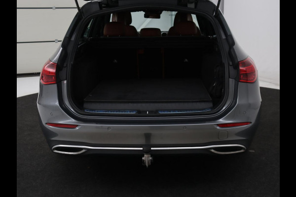 Mercedes-Benz C-Klasse 300e Luxury Line | SOH 92% | Leder | Trekhaak | Stoelverwarming | Sfeerverlichting | Carplay | Full LED | Navigatie | Camera | Park Assist | Dodehoek detectie | PHEV | Plug In