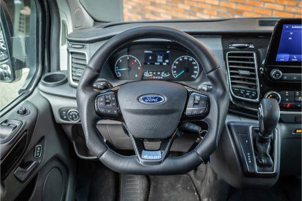 Ford Transit Custom MS-RT 320 2.0 TDCI L2H1 DC | ACC | BLIS | Bi-Xenon | Elek stoel | CarPlay | Navigatie | Camera | Stoelverwarming | L+R Schuifdeur | Lederen bekleding | Spoiler-pakket | Nieuwe APK | Verlengde fabrieksgarantie