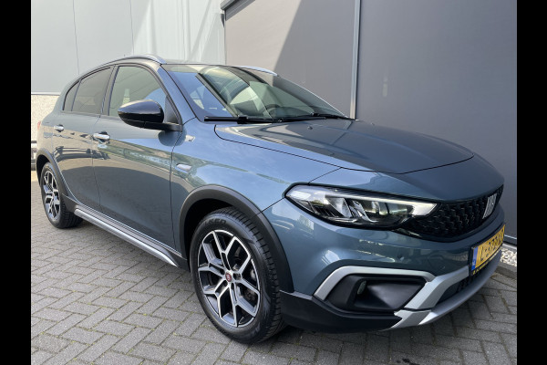 Fiat Tipo Cross 1.0 Cross Airco - Achteruitrijcamera - Parkeersensoren - Navigatie - Stoelverwarming - U-connect - Licht metalen velgen 17 inch - Trekhaak afneembaar - Cruise control - Radio - Mistlampen - Bluetooth - Dakrails - Elektrische ramen - Extra getint glas achter - Led verlichting - Start/stop systeem - Nieuw bij ons geleverd