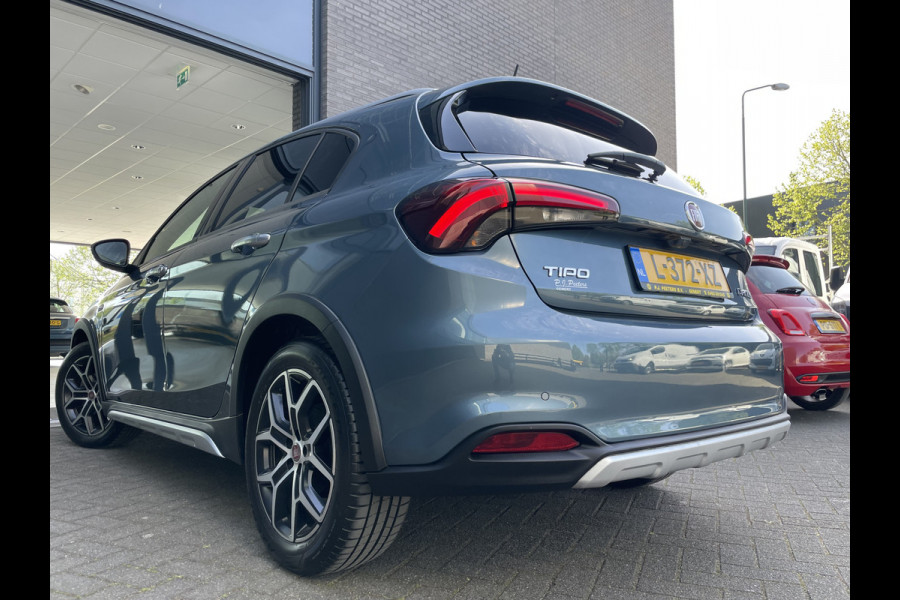 Fiat Tipo Cross 1.0 Cross Airco - Achteruitrijcamera - Parkeersensoren - Navigatie - Stoelverwarming - U-connect - Licht metalen velgen 17 inch - Trekhaak afneembaar - Cruise control - Radio - Mistlampen - Bluetooth - Dakrails - Elektrische ramen - Extra getint glas achter - Led verlichting - Start/stop systeem - Nieuw bij ons geleverd