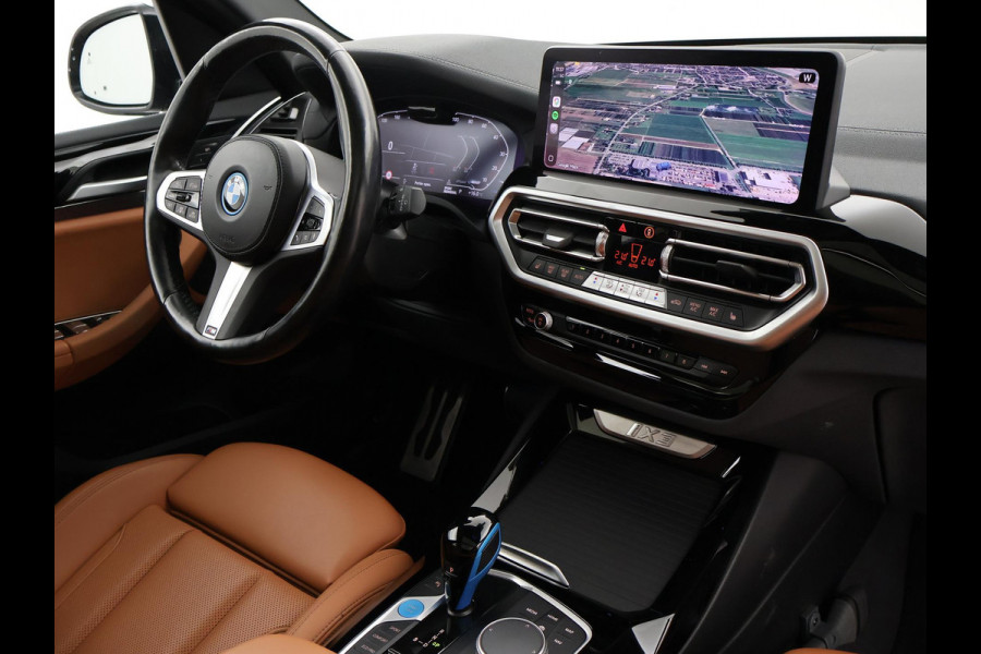 BMW iX3 80 kWh FACELIFT M-SPORT + ELEKTR. TREKHAAK SPORTSTOELEN LEDER | PANORAMA | ADAPTIVE CRUISE | MEMORY