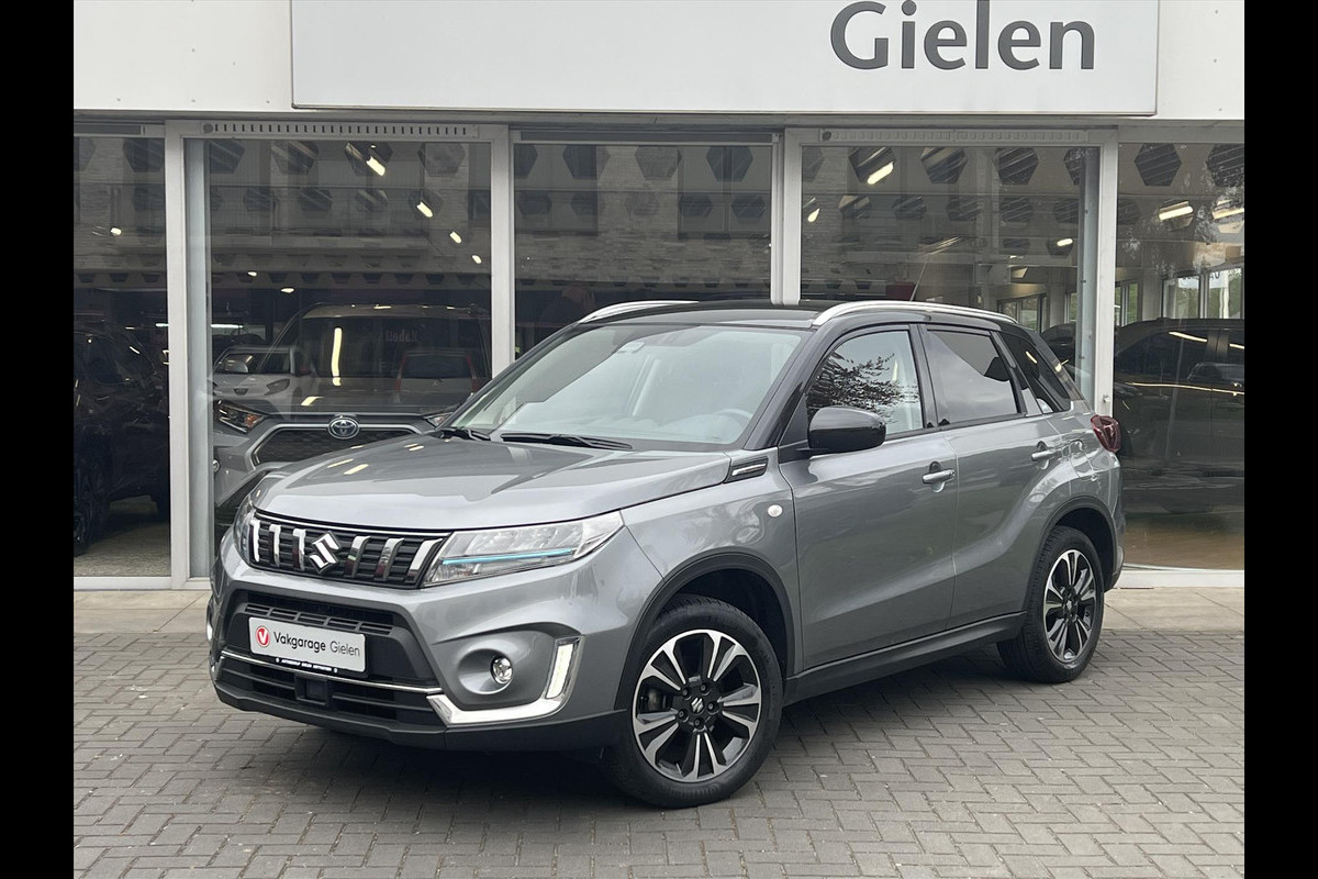 Suzuki Vitara 1.5 Hybrid Automaat Select Bi-Tone | Eerste eigenaar, Trekhaak, Dodehoekherkenning, Stoelverwarming, 17 inch, LED