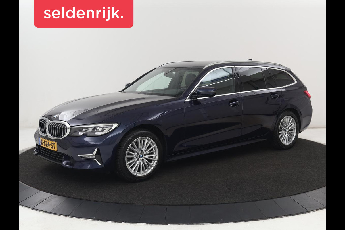 BMW 3 Serie 318i Luxury Line | Sportstoelen | Leder | Carplay | Live Cockpit | Sfeerverlichting | Trekhaak | Parkeerhulp | Climate control | Full LED | Cruise control | Bluetooth
