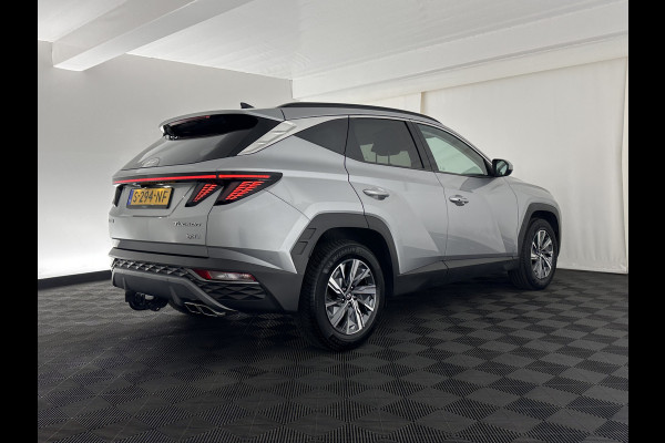 Hyundai Tucson 1.6 T-GDI HEV Comfort Smart (INCL-BTW) *FULL-LED | ADAPTIVE-CRUISE | HEATED-COMFORTSEATS | KEYLESS | CAMERA | DIGI-COCKPIT | PRIVACY-GLASS | SHIFTPADDLES | ECC | PDC | 17''ALU*