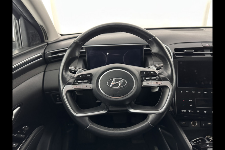 Hyundai Tucson 1.6 T-GDI HEV Comfort Smart (INCL-BTW) *FULL-LED | ADAPTIVE-CRUISE | HEATED-COMFORTSEATS | KEYLESS | CAMERA | DIGI-COCKPIT | PRIVACY-GLASS | SHIFTPADDLES | ECC | PDC | 17''ALU*