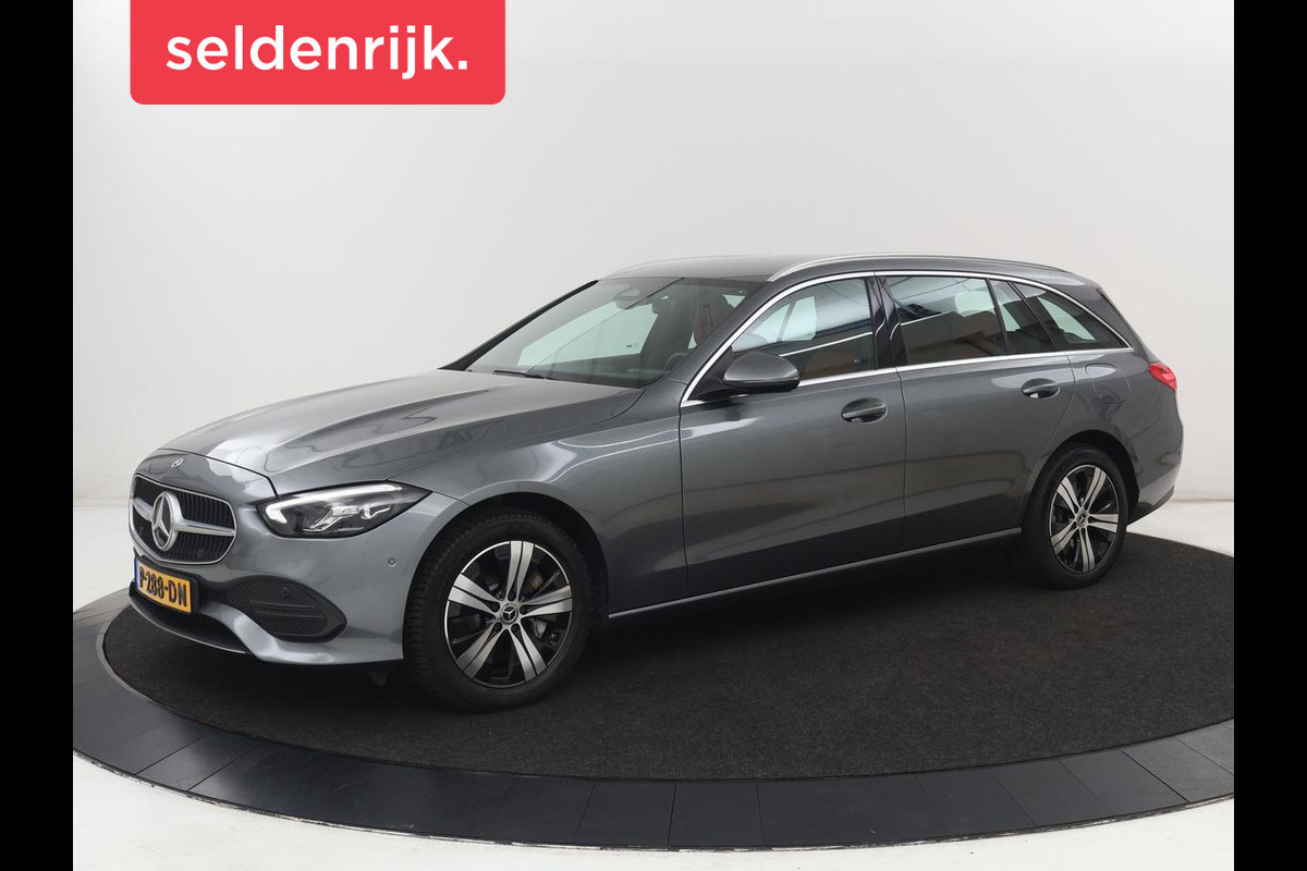 Mercedes-Benz C-Klasse 300e Luxury Line | SOH 92% | Leder | Trekhaak | Stoelverwarming | Sfeerverlichting | Carplay | Full LED | Navigatie | Camera | Park Assist | Dodehoek detectie | PHEV | Plug In