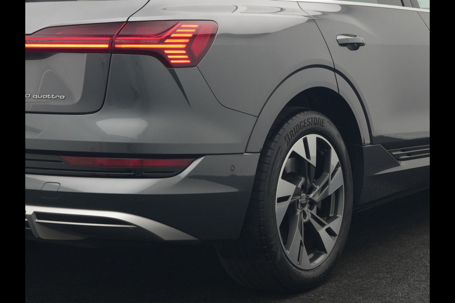 Audi e-tron 50 Quattro 2x S Line 313pk Dealer O.H INCL BTW | Luchtvering | Panodak | Head Up | Adaptive Cruise | Sfeerverlichting | Lederen Sportstoelen Verwarmd | Keyless | Navigatie | 20"L.M | DAB | Virtual |