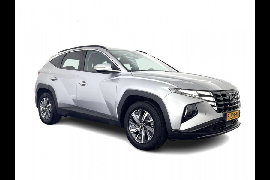 Hyundai Tucson 1.6 T-GDI HEV Comfort Smart (INCL-BTW) *FULL-LED | ADAPTIVE-CRUISE | HEATED-COMFORTSEATS | KEYLESS | CAMERA | DIGI-COCKPIT | PRIVACY-GLASS | SHIFTPADDLES | ECC | PDC | 17''ALU*