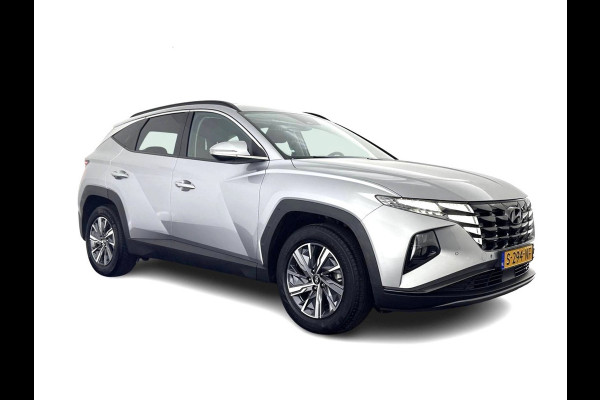 Hyundai Tucson 1.6 T-GDI HEV Comfort Smart (INCL-BTW) *FULL-LED | ADAPTIVE-CRUISE | HEATED-COMFORTSEATS | KEYLESS | CAMERA | DIGI-COCKPIT | PRIVACY-GLASS | SHIFTPADDLES | ECC | PDC | 17''ALU*