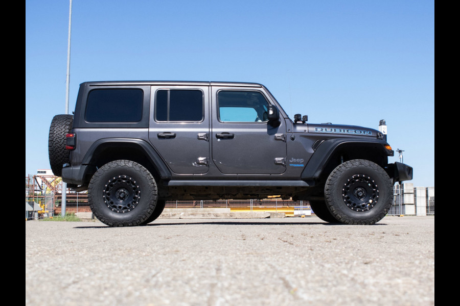 Jeep Wrangler Unlimited 4xe 380 Rubicon (APPEL CARPLAY,HARDTOP,NAVI,VERHOODG,BILSTEIN-SCHOKDEMPERS,KMC VELGEN,EXTRA VERLICHTING)