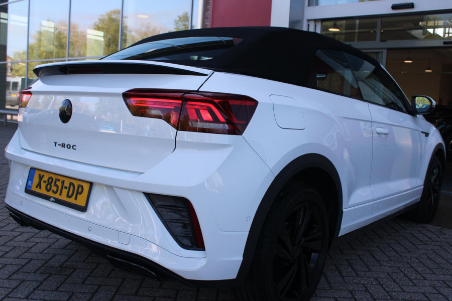 Volkswagen T-Roc Cabrio 1.5 TSI 150PK AUTOMAAT R-LINE BLACK STYLE | AFNEEMBARE TREKHAAK | ACHTERUITRIJCAMERA | NAVIGATIE  | IQ LIGHT MATRIX KOPLAMPEN | DAB+ RADIO | DRAADLOOS APPLE CARPLAY/ANDROID AUTO | ADAPTIVE CRUISE CONTROL | STOEL/STUUR VERWARMING | 18" LICHTMETALEN VELGEN BLACK | PARKEERSENSOREN VOOR + ACHTER | VIRTUAL COCKPIT | DODEHOEK DETECTIE | R-LINE BEKLEDING | DAB+ RADIO |