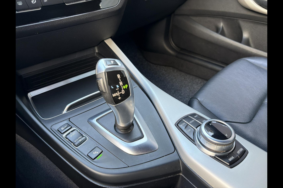 BMW 1-serie 118i Executive Automaat Incl. Stoelverwarming | Lederen stoelen| Parkeersensoren | Navigatie