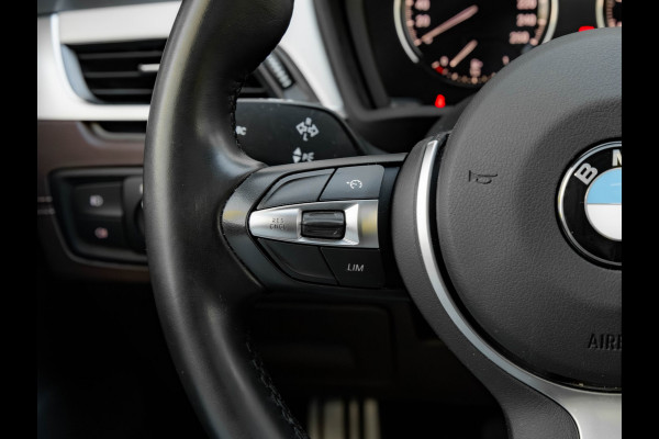 BMW X1 sDrive20i M-Sport - Pano - Trekhaak - Memoryzetel - Camera - Harman Kardon