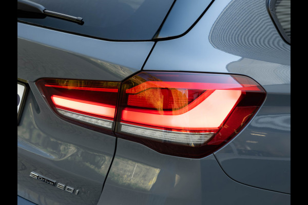 BMW X1 sDrive20i M-Sport - Pano - Trekhaak - Memoryzetel - Camera - Harman Kardon