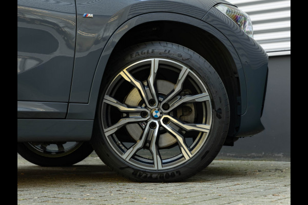 BMW X1 sDrive20i M-Sport - Pano - Trekhaak - Memoryzetel - Camera - Harman Kardon