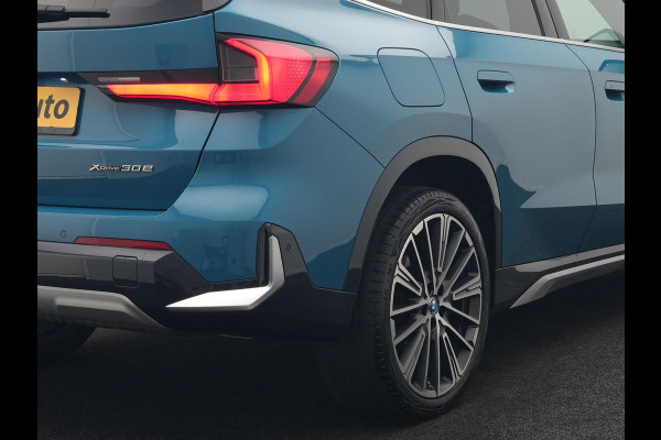 BMW X1 xDrive30e X Line PHEV 327pk Dealer O.H. | 20" Individual | Camera | Lederen Sportstoelen & Stuur Verwarmd | Sfeerverlichting | Apple Carplay | Blis | Keyless | Navigatie | DAB | Cruise Control | 20"L.M | Plug In Hybrid |