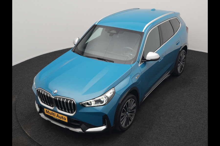 BMW X1 xDrive30e X Line PHEV 327pk Dealer O.H. | 20" Individual | Camera | Lederen Sportstoelen & Stuur Verwarmd | Sfeerverlichting | Apple Carplay | Blis | Keyless | Navigatie | DAB | Cruise Control | 20"L.M | Plug In Hybrid |