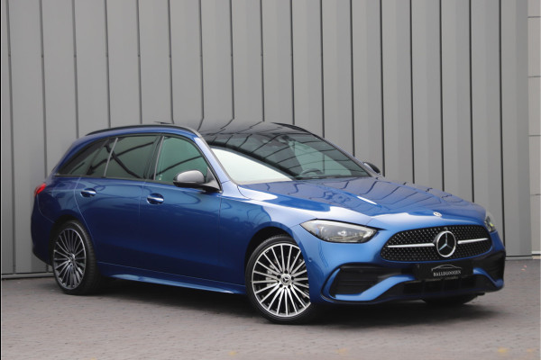 Mercedes-Benz C-Klasse Estate 300e AMG | 313PK | Massage | Head-up | Keyless | Sfeerverlichting | Stoelkoeling | Distronic+ | Leder | 2022.