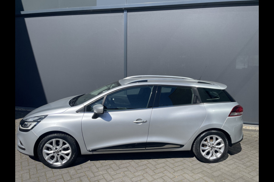 Renault Clio Estate 0.9 TCe Intens Airco - Achteruitrijcamera - Parkeersensor achter - Navigatie - Cruise control - Dakrails - Licht metalen velgen 16 inch - Led verlichting - Elektrische ramen - Keyless entry/ start - Bluetooth - Stuur multifunctioneel - Stuur leder - Radio
