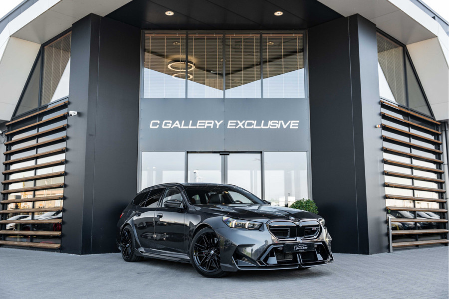BMW 5 Serie Touring M5 - M Performance Pakket | Panorama | B&W | Carbon | Elek. Trekhaak | 360 Camera