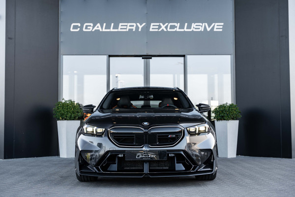 BMW 5 Serie Touring M5 - M Performance Pakket | Panorama | B&W | Carbon | Elek. Trekhaak | 360 Camera