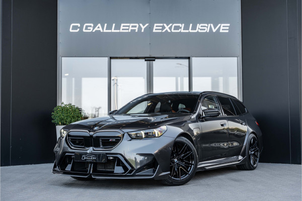 BMW 5 Serie Touring M5 - M Performance Pakket | Panorama | B&W | Carbon | Elek. Trekhaak | 360 Camera