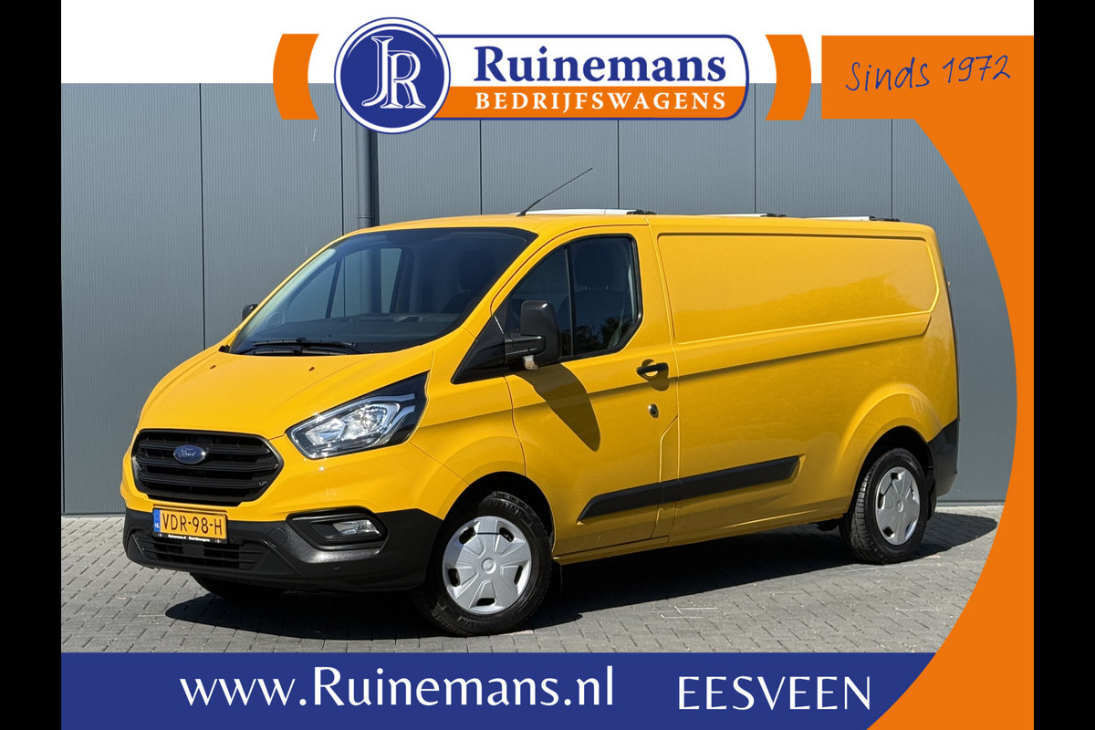 Ford Transit Custom 2.0 TDCI / L2H1 / 1e EIG. / AIRCO / CRUISE / 2.8 TONS TREKHAAK / STOELVERW / PDC / DAKDRAGERS