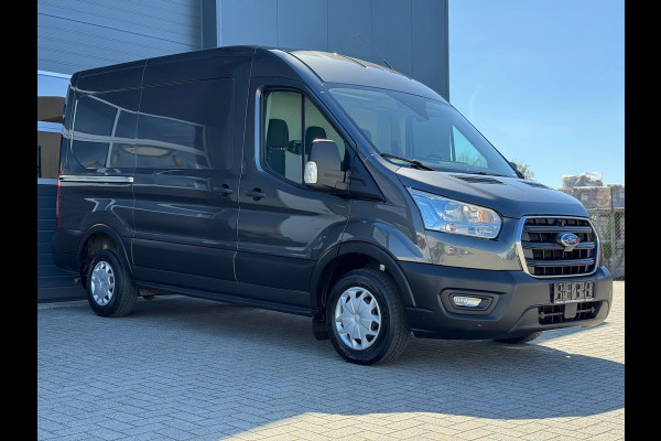 Ford Transit 310 2.0 TDCI L2H2 Trend | Trekhaak | Metallic | Cruise | Bluetooth | Airco | Laadvloer | Parkeersensoren | EURO6