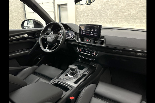 Audi Q5 50 TFSI e 300PK | Luchtvering | B&O Sound | Leder | Carbon | Sportstoelen | Carplay | Zwarte Hemel | Standkachel | Stoelverwarming | 3-Zone Clima | Black-Optic | Zonwering | Virtual Cockpit | LED | Autom. Achterklep | Bovag Garantie |