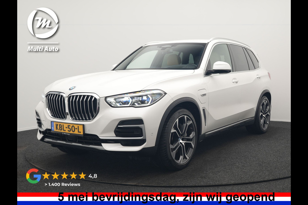 BMW X5 xDrive45e X Line PHEV 395pk Dealer O.H. | Trekhaak Af Fabriek | Luchtvering | Adaptive Cruise | Head Up | 360 Camera | Adaptief Onderstel | Laser LED | Lederen Sportstoelen Memory & Verwarmd | Sfeerverlichting | Keyless | Plug In H
