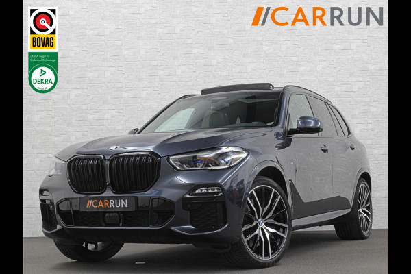 BMW X5 xDrive40i M-Sport | Panorama | 360 Camera | ACC | Laser-LED | Head-Up | Harman-Kardon | Trekhaak | Keyless-Entry | 22 inch | Memory | Leder | Carplay | Dealer Onderhouden | ISO-Glas | Sfeerverlichting | Draadloos Laden |