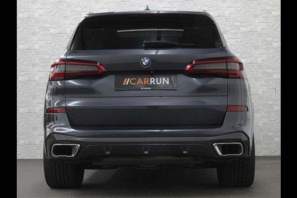 BMW X5 xDrive40i M-Sport | Panorama | 360 Camera | ACC | Laser-LED | Head-Up | Harman-Kardon | Trekhaak | Keyless-Entry | 22 inch | Memory | Leder | Carplay | Dealer Onderhouden | ISO-Glas | Sfeerverlichting | Draadloos Laden |