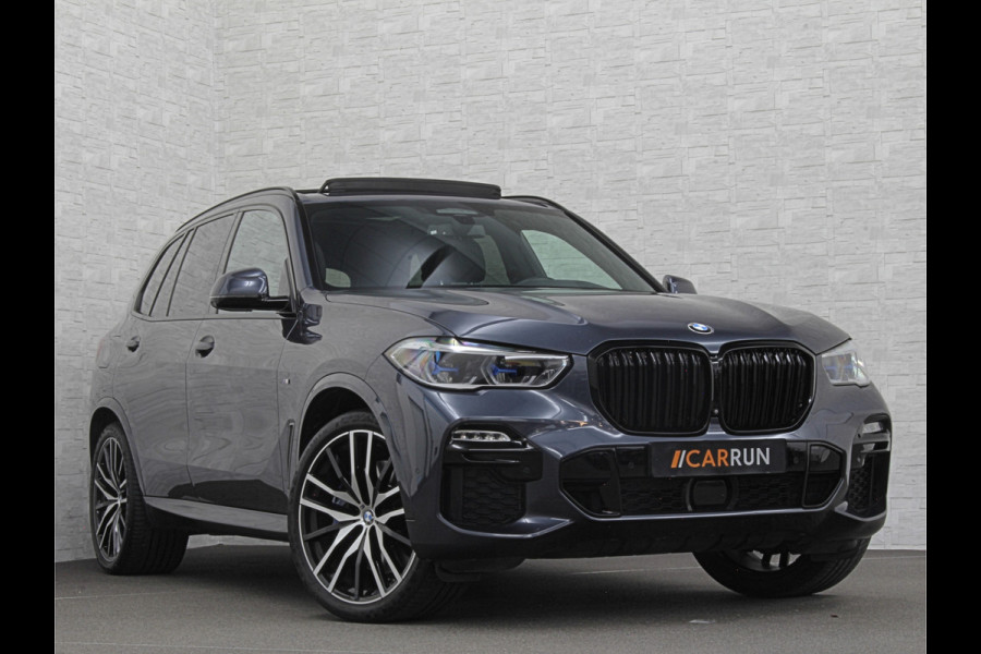 BMW X5 xDrive40i M-Sport | Panorama | 360 Camera | ACC | Laser-LED | Head-Up | Harman-Kardon | Trekhaak | Keyless-Entry | 22 inch | Memory | Leder | Carplay | Dealer Onderhouden | ISO-Glas | Sfeerverlichting | Draadloos Laden |