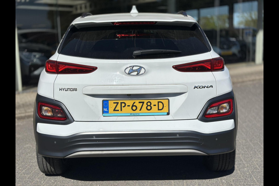 Hyundai Kona EV Premium 64 kWh | SOH: 96,8% | Leder | LED | Camera | Blindspot | Lage km-stand! |