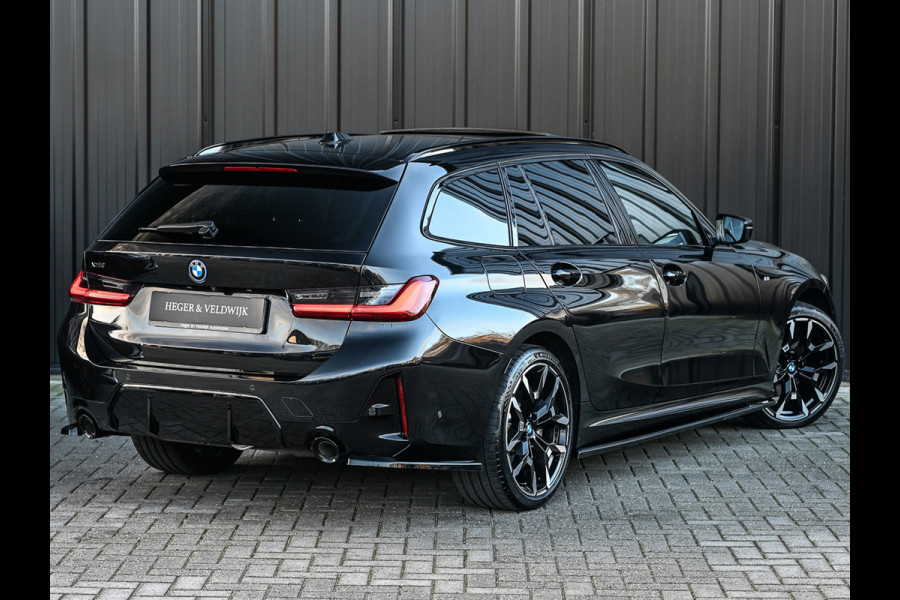 BMW 3 Serie Touring 330e xDrive M sport | Accu 19,5kWh | Trekhaak | Panorama dak  | Active Cruise | Camera  | Ambiance interieur