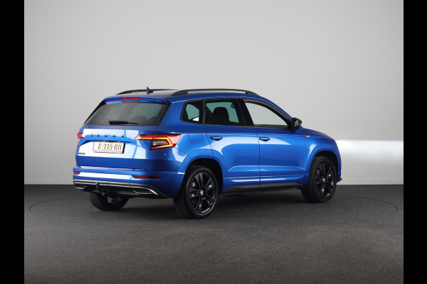 Škoda Karoq 1.5 TSI ACT Sportline Business 150pk | Wegklapbare trekhaak | Navigatie | Parkeercamera | Led koplampen